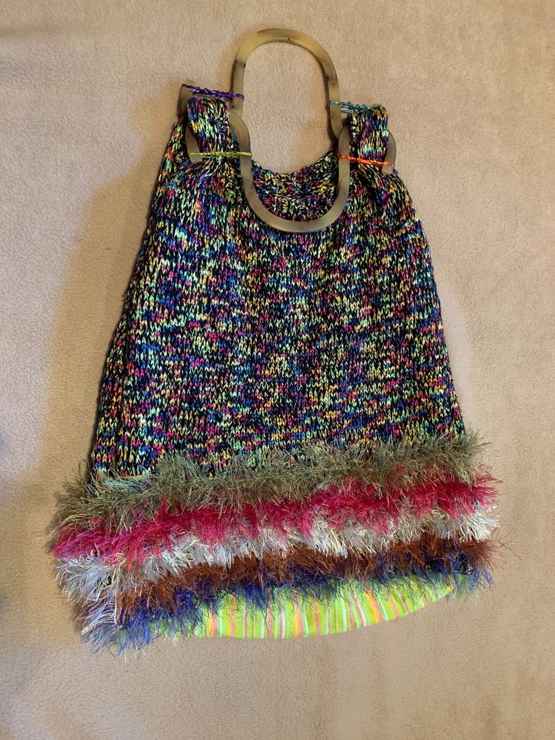 Triangle multi bag with tortoise-colored shell handles