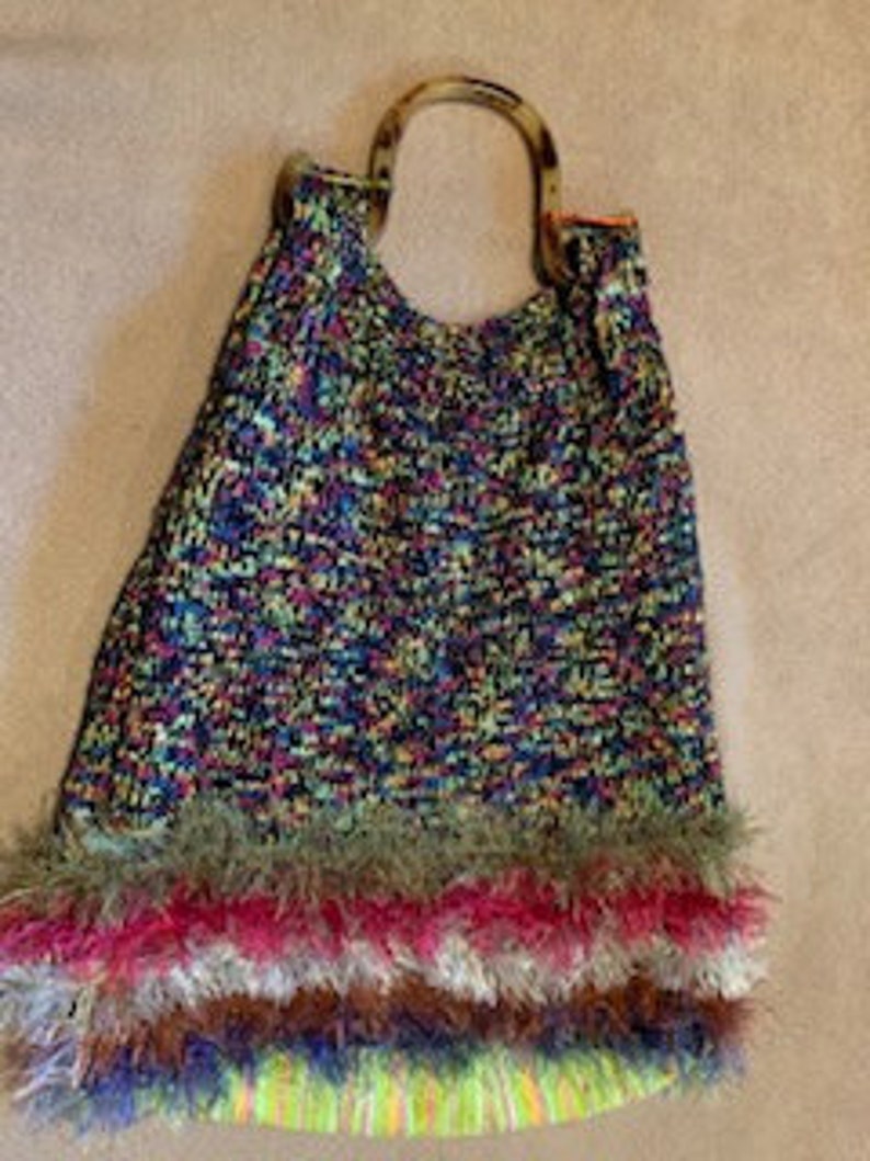 Triangle multi bag with tortoise-colored shell handles