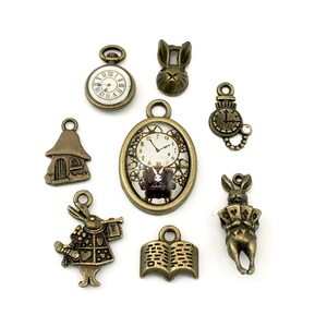 8 tiny alice in wonderland charms collection bronze tone including 1 glass pendant,10mm to 26mm #ENS B 043