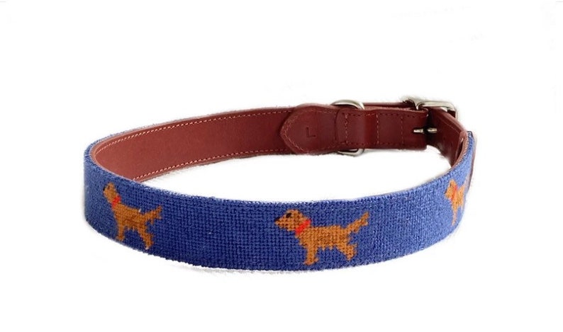 Hand stitched needlepoint Golden Retriever dog collar by Asher Riley. Monogramming available. Leather and brass hardware.