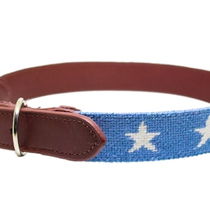 Hand stitched needlepoint stars and stripes dog collar by Asher Riley. Monogramming available. Leather and brass hardware.