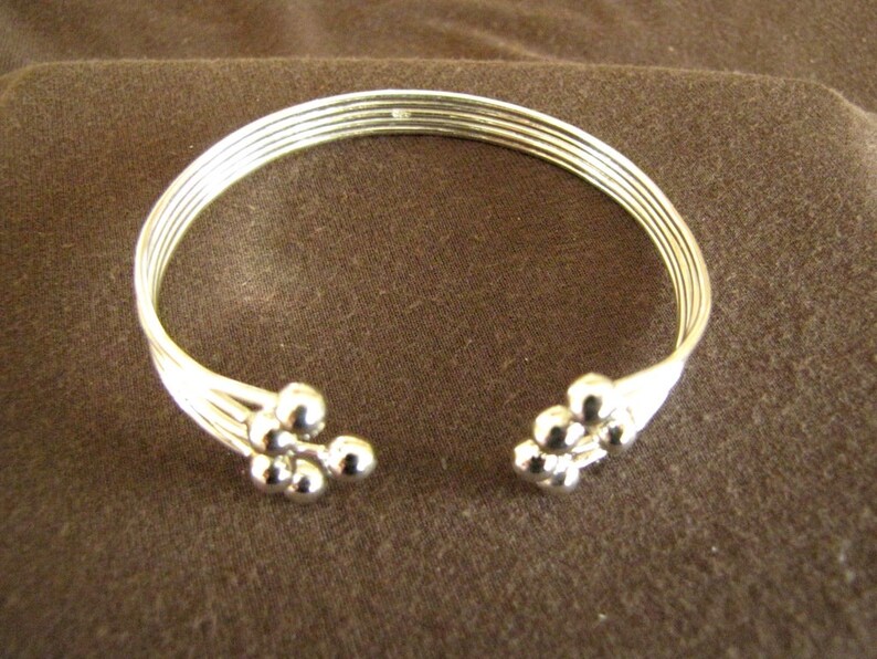 Sterlling Silver Open Front Balls Bangle