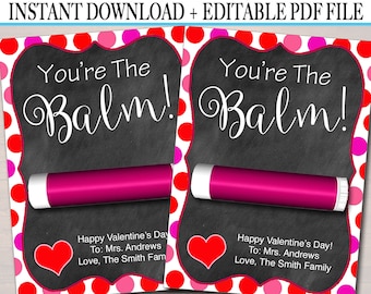 May include: Two printable Valentine's Day gift tags with a red and pink polka dot background. The tags feature a chalkboard with the text "You're The Balm!" and a pink lip balm. The text "Happy Valentine's Day! To: Mrs. Andrews Love, The Smith Family" is also included on the tags.