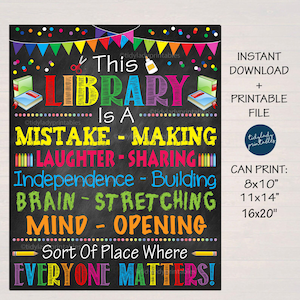 May include: A colorful chalkboard sign with the text "This Library is a Mistake-Making, Laughter-Sharing, Independence-Building, Brain-Stretching, Mind-Opening Sort of Place Where Everyone Matters!"  The sign is decorated with colorful flags, confetti, and a pencil and glue.