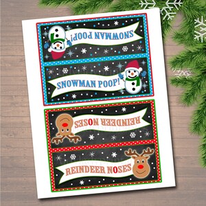May include: Four printable Christmas gift tags with a chalkboard background. The tags feature a snowman, reindeer, and the text "Snowman Poop!" and "Reindeer Noses".