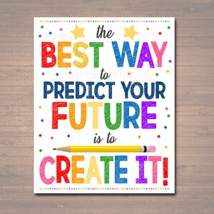May include: A colorful motivational poster with the text "The best way to predict your future is to create it!" The text is written in a rainbow of colors and has a sketched look. There are two yellow stars above the word "best".