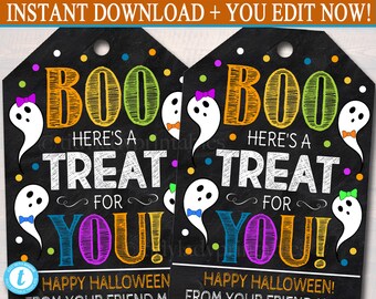 May include: Two Halloween-themed gift tags with a black chalkboard background. The tags feature the word "BOO" in orange and green, and the phrase "HERE'S A TREAT FOR YOU!" in white. White ghost illustrations with colorful bows and confetti complete the design. Text at the bottom reads "HAPPY HALLOWEEN!"