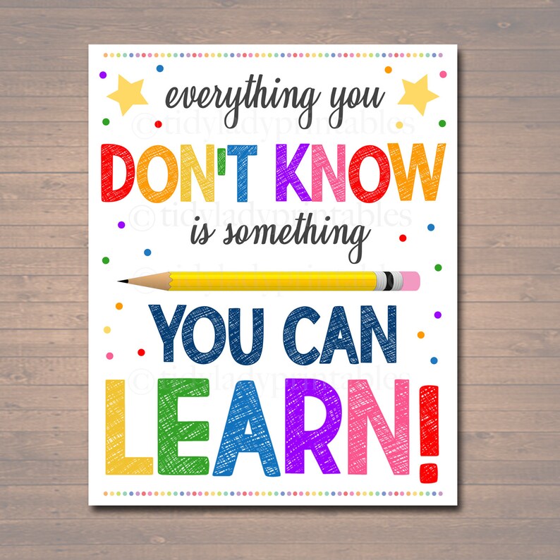 May include: A colorful educational print with the text "everything you DON'T KNOW is something YOU CAN LEARN!" A yellow pencil graphic is centered below the text. The print is decorated with colorful dots and stars.