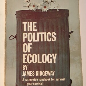 May include: A vintage paperback book cover with a green metal trash can filled with white daisies. The title of the book is "The Politics of Ecology" by James Ridgeway. The subtitle is "A nationwide handbook for survival - your survival".