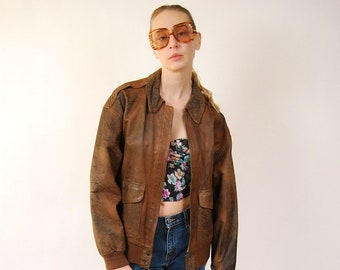 80s Leather Bomber Jacket (XL) vintage distressed women brown