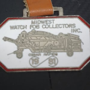 Vintage Silver tone and Enamel Midwest Watch Fob Collectors Inc Cedar Rapids 1981 with Brown Leather Strap