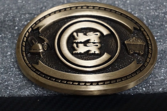 oc tanner belt buckle