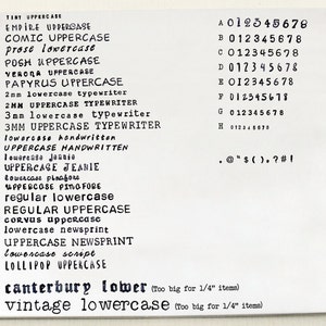 May include: A white sheet of paper with a variety of fonts and font sizes printed on it. The fonts are labelled with their names and whether they are uppercase or lowercase. The text includes: Tiny Uppercase, Empire Uppercase, Comic Uppercase, Prose Lowercase, Posh Uppercase, Verona Uppercase, Papyrus Uppercase, 2mm Lowercase Typewriter, 2MM Uppercase Typewriter, 3mm Lowercase Typewriter, 3MM Uppercase Typewriter, Lowercase Handwritten, Uppercase Handwritten, Lowercase Jeanie, Uppercase Jeanie, Lowercase Pinafore, Uppercase Pinafore, Regular Lowercase, Regular Uppercase, Corvus Uppercase, Lowercase Newsprint, Uppercase Newsprint, Lowercase Script, Lollipop Uppercase, Canterbury Lower (Too big for 1/4" items), Vintage Lowercase (Too big for 1/4" items).