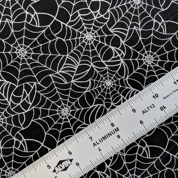 Fabric quilt silver metallic spider webs on black 1//4 yard Halloween