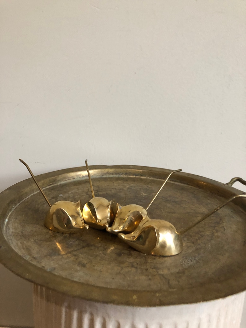 vintage brass mouse ring or receipt holders