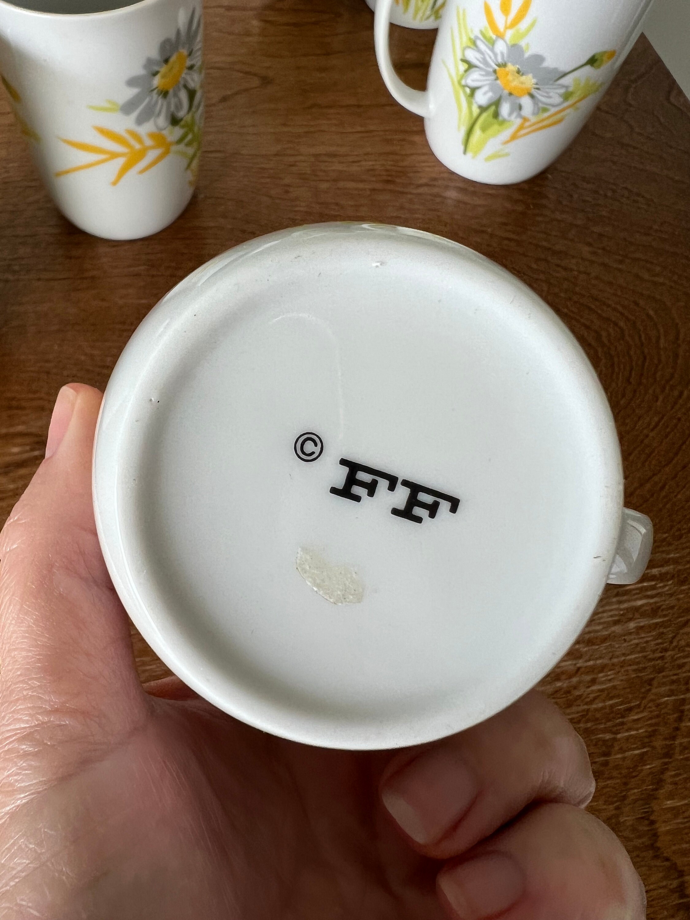 Fitz and Floyd vintage yellow green white and gray daisy mugs