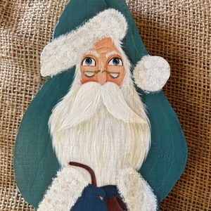 Vintage wood folk art Santa with a cat farmhouse rustic Christmas decor