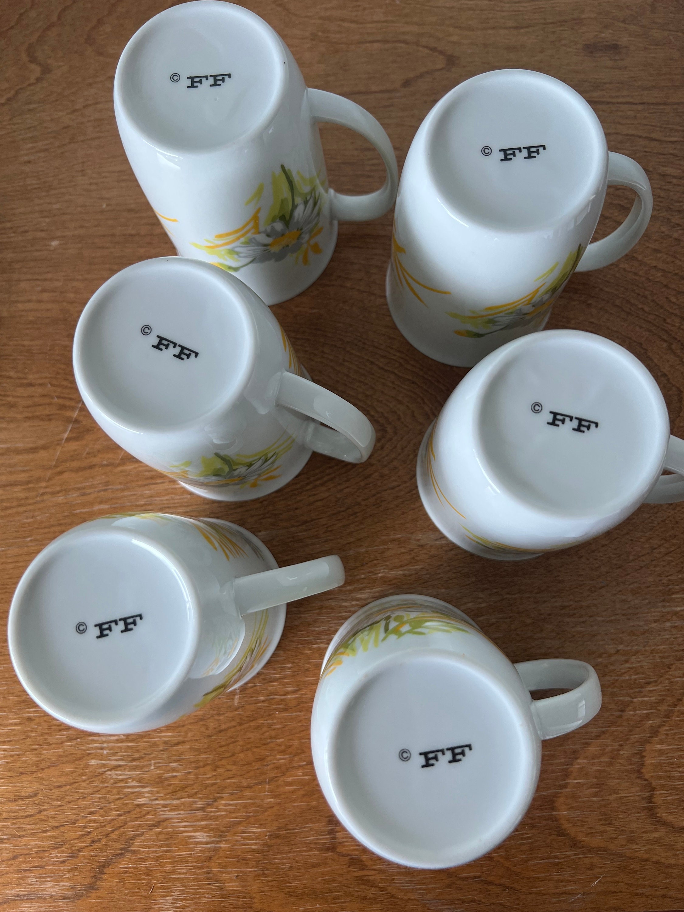 Fitz and Floyd vintage yellow green white and gray daisy mugs