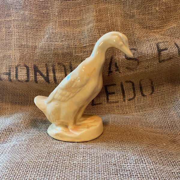 Vintage Shawnee pottery duck planter in yellow