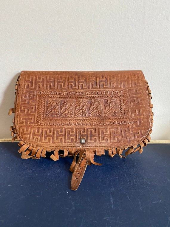 vintage boho chic leather clutch 1960s 1970s hippi