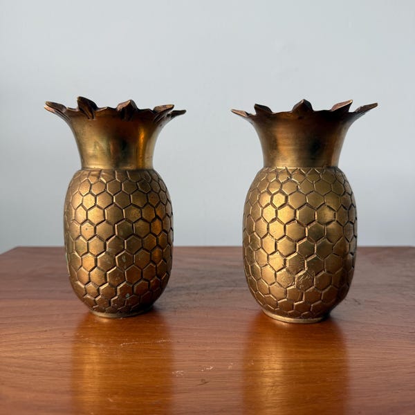 pair of brass pineapple vases