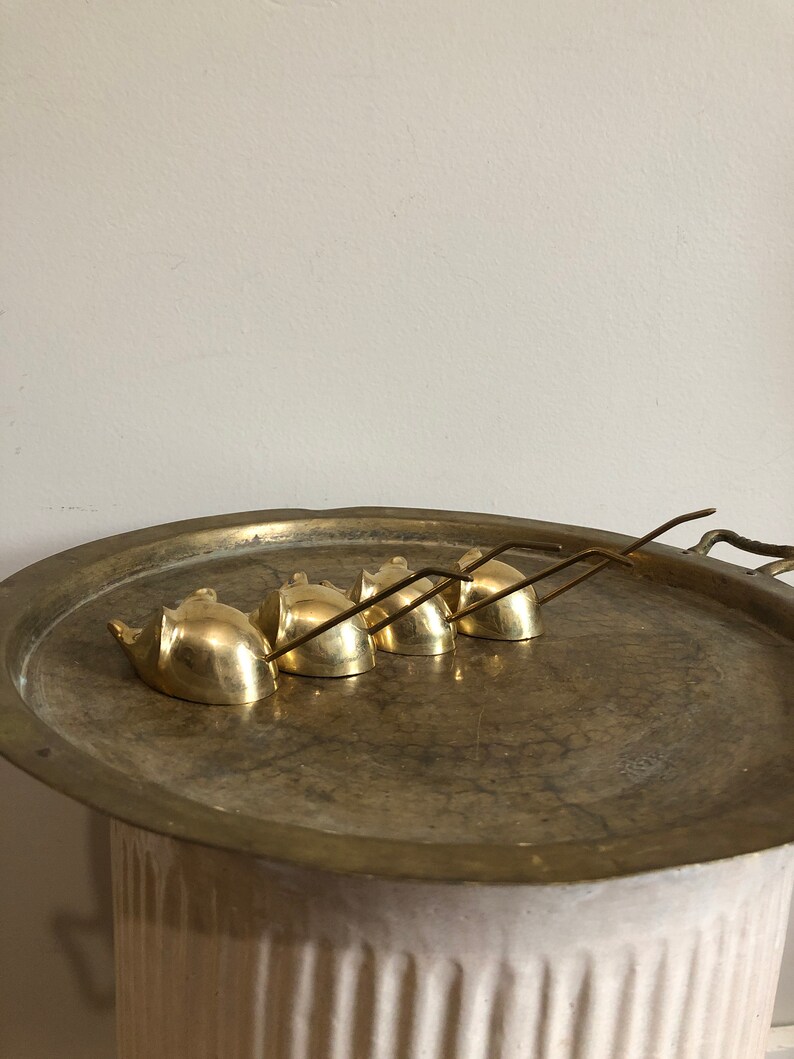 vintage brass mouse ring or receipt holders
