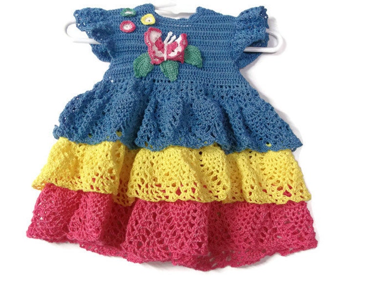 Tricolor ruffles Baby Crochet Lace Dress , Reborn doll, new born, Handmade Crochet Blue, yellow and pink with butterfly , flowers and leaves image 1