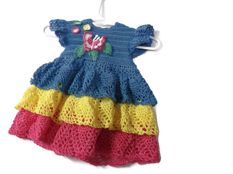 Tricolor ruffles Baby Crochet Lace Dress , Reborn doll, new born, Handmade Crochet Blue, yellow and pink with butterfly , flowers and leaves image 4