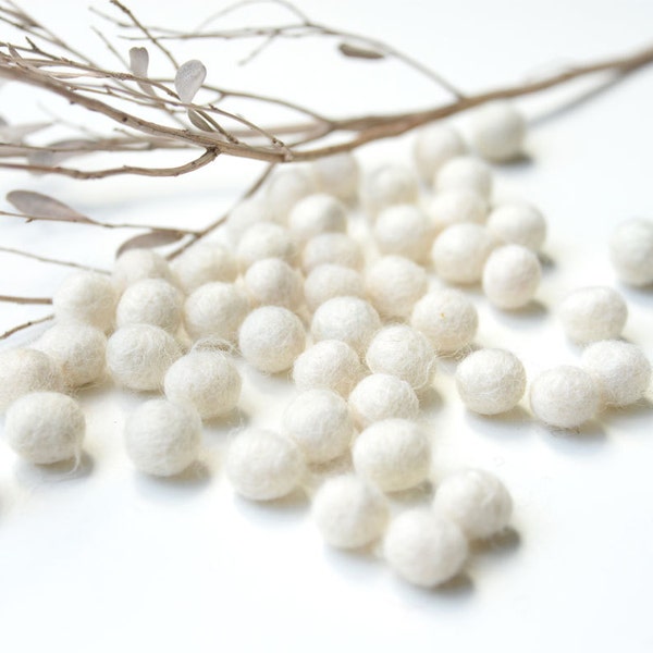 1cm WHITE Felt Balls x50 1cm to 1.5cm. Wool. Felt ball beads. Bulk. Wholesale Decor. Decoration. DIY.