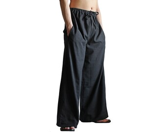 May include: Black wide-leg pants with a drawstring waist.