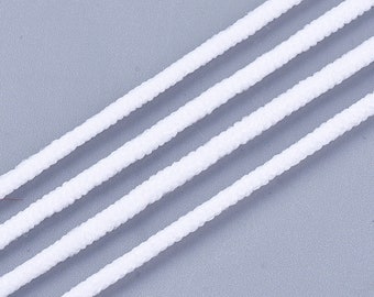 May include: Four parallel strands of white elastic cord arranged diagonally across the frame. Each cord features a consistent, braided, or woven texture with a rounded profile, showing a clean, uniform appearance throughout the length of the material.