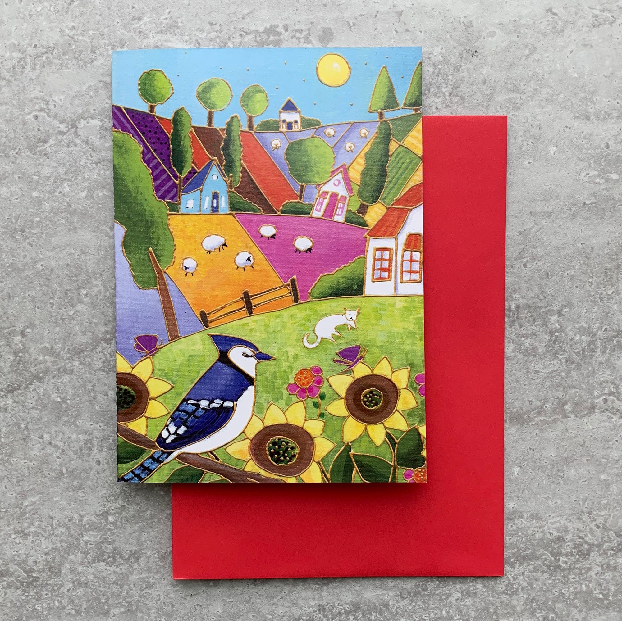 Greeting card landscape colourful houses blue jay sunflower gift card