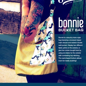 May include: A yellow and white bucket bag with a horse print fabric. The bag has a zipper closure and a double welt pocket. The bag is called "Bonnie" and is a sewing pattern from Swoon Sewing Patterns.