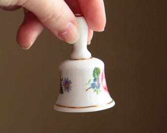 Vintage white ceramic petite bell with floral design / bell from bone china made in England