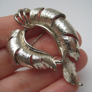 Vintage Hollywood zilverkleurige broche uit de jaren 50