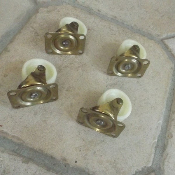 Lot of 4pc x 5, total 20 pc for choice ( quantity) furniture wheels. Swivel casters. 1 5/8" diameter, 1.5" x 2 1/4" the plate with 4 holes.