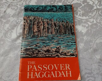 Vintage Passover Haggadah book of 1965. Illustrated. Size: 9"H x 6 1/8" English Hebrew. New old stock Abraham Regelson. Zalman Kleinmam