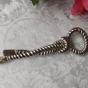 Vintage collectible metal silver and gold plated Bottle Opener . Gift idea.  5 3/4&quot;L New old stock