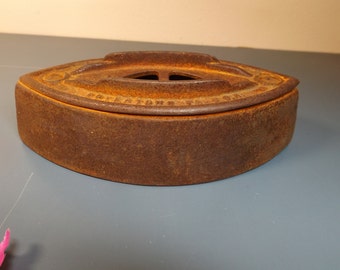 Antique Iron. Door stop, Cast Iron. Farmhouse/office decor 6 1/4" x 3 " x 2"H Colebroocrdale Iron Co Boyertown, PA USA.Rusty. Home decor