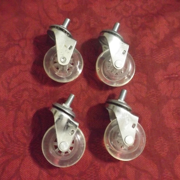 Lot of 4  furniture wheels 2" diameter, 5/8" the screws. Condition is excellent usable.
