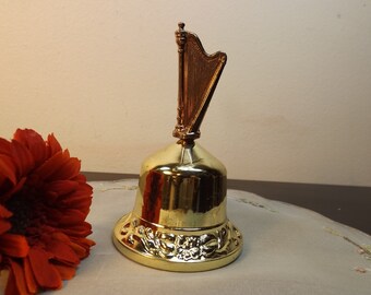 Gold tone bell with charming rose above. Beautiful home decor in excellent condition.Gift for her. 3 1/4"H .