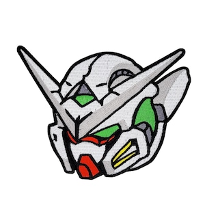 May include: White, green, and red embroidered patch of a robot head with a large, pointed visor.