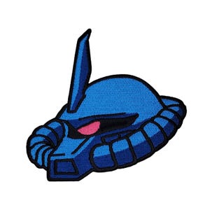 May include: Blue and black embroidered patch of a cartoon robot head with a pink eye. The robot has a large antenna and a blue and black body.