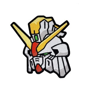 May include: Embroidered patch of a white, yellow, and red robot head with a green visor. The robot has a yellow antenna and a red mouth.
