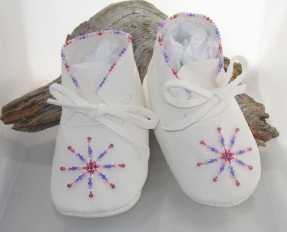 white leather baby shoes