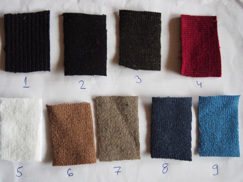 May include: Nine fabric swatches in different colors and textures, numbered 1 through 9. The swatches are arranged in two rows of five, with the last swatch in the second row missing.