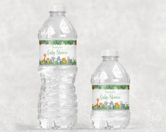 May include: Two clear plastic water bottles with green and white labels. The labels feature a jungle theme with cartoon animals and the text "Jessica's Baby Shower".