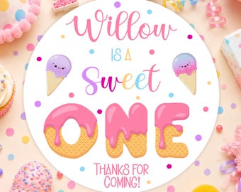 May include: A circular sticker featuring the text Willow IS A Sweet ONE and THANKS FOR COMING! The design includes two illustrated ice cream cones and the word ONE styled as waffle cones with pink icing, surrounded by colorful confetti dots.