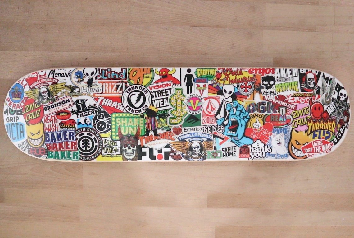 Skateboard Deck With Images of Stickers From the Best Skateboarding ...