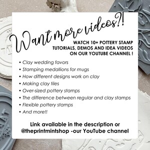 May include: A white rectangular sign with black text that reads: Want more videos?! WATCH 10+ POTTERY STAMP TUTORIALS, DEMOS AND IDEA VIDEOS ON OUR YOUTUBE CHANNEL! It lists topics like clay wedding favours, mugs, tiles, and stamps. Link at @theprintmintshop.